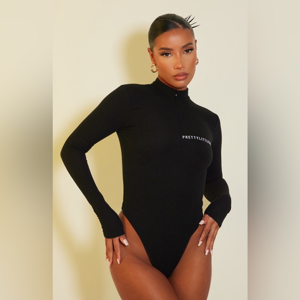 PRETTYLITTLETHING Black Crinkle Rib Half Zip Bodysuit